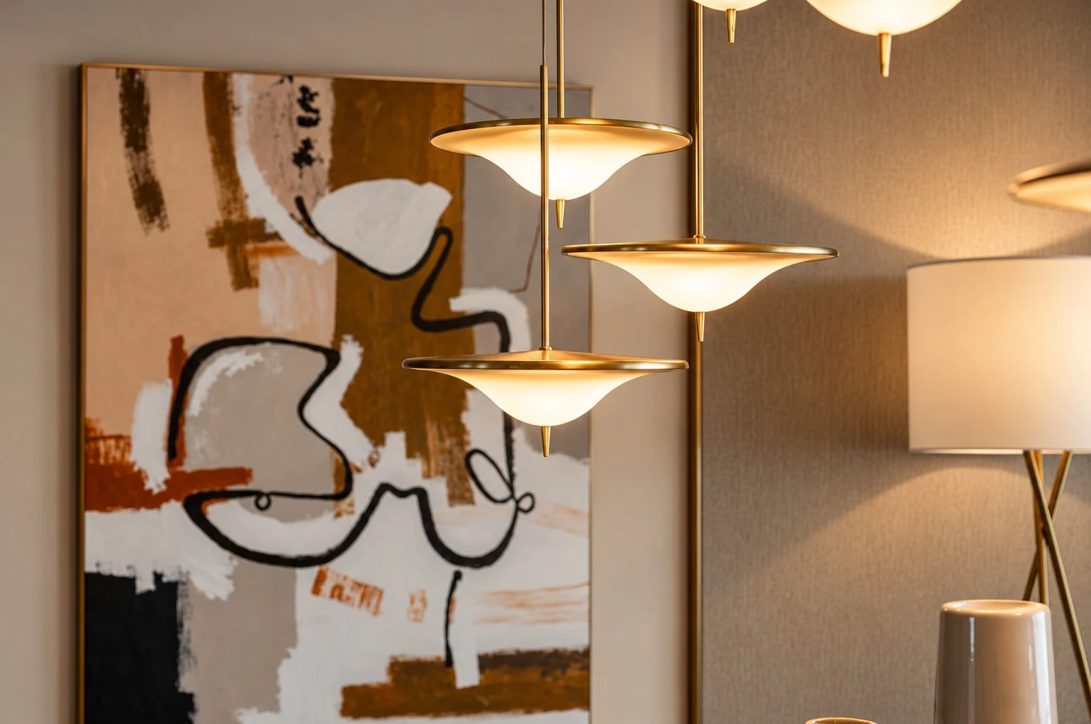 Bvlgari Residences II — A sculptural chandelier balances warm, diffused light with a finely articulated brass framework.